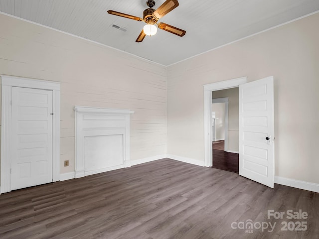 226 Dobbins Rd, Ellenboro, NC 28040 - unfurnished room featuring ceiling fan, dark wood-style flooring, baseboards, and ornamental molding