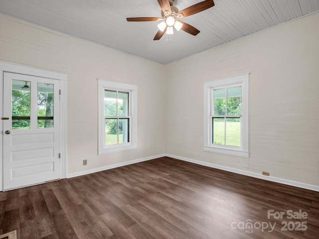 226 Dobbins Rd, Ellenboro, NC 28040 - unfurnished room featuring baseboards, dark wood finished floors, and a ceiling fan