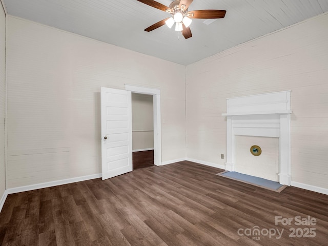 226 Dobbins Rd, Ellenboro, NC 28040 - unfurnished living room featuring ceiling fan, dark wood-type flooring, and baseboards