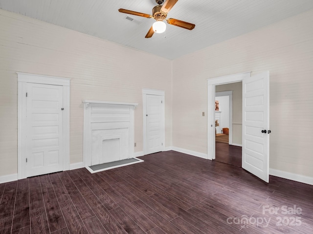 226 Dobbins Rd, Ellenboro, NC 28040 - unfurnished bedroom featuring dark wood-style flooring, a ceiling fan, and baseboards
