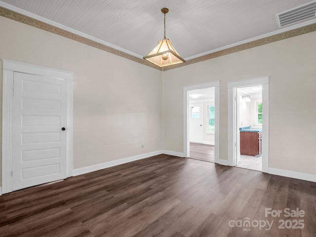 226 Dobbins Rd, Ellenboro, NC 28040 - spare room with ornamental molding, baseboards, and dark wood-type flooring