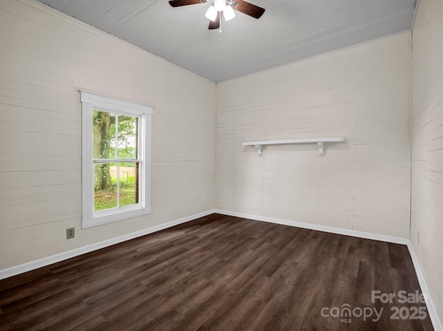 226 Dobbins Rd, Ellenboro, NC 28040 - unfurnished room featuring a ceiling fan, dark wood-style flooring, and baseboards