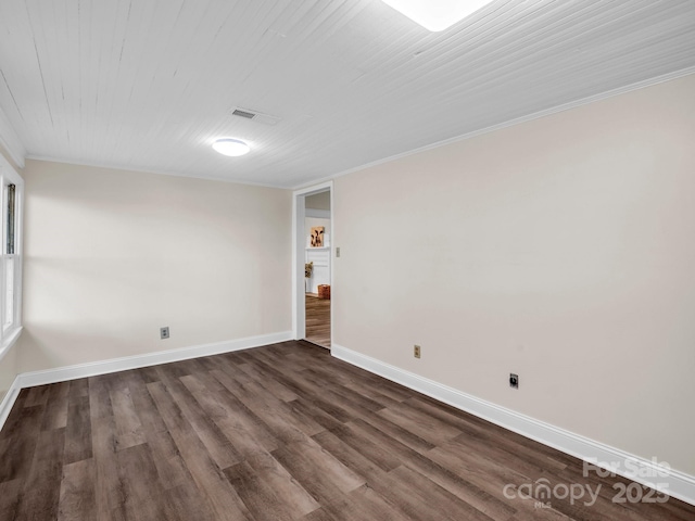 226 Dobbins Rd, Ellenboro, NC 28040 - unfurnished room with baseboards, dark wood finished floors, and crown molding
