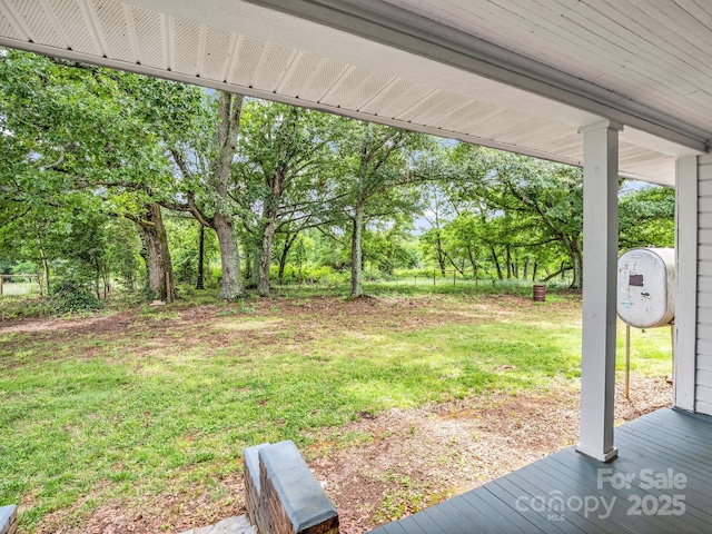226 Dobbins Rd, Ellenboro, NC 28040 - view of grassy yard with view of wooded area