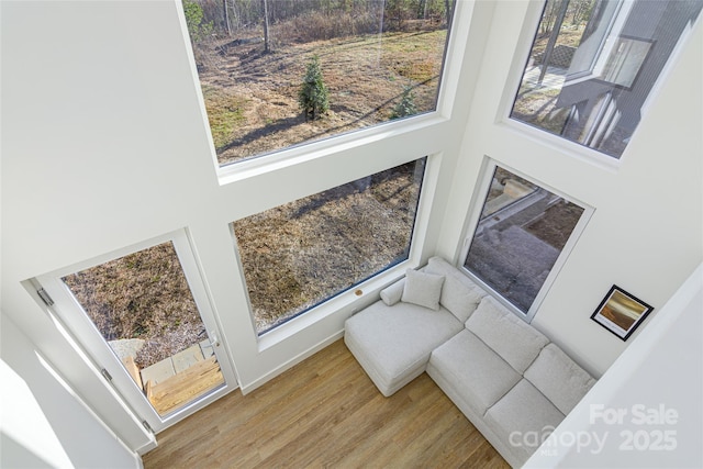 75 S Fork Trl, Lake Toxaway, NC 28747 - sitting room featuring a high ceiling and wood finished floors