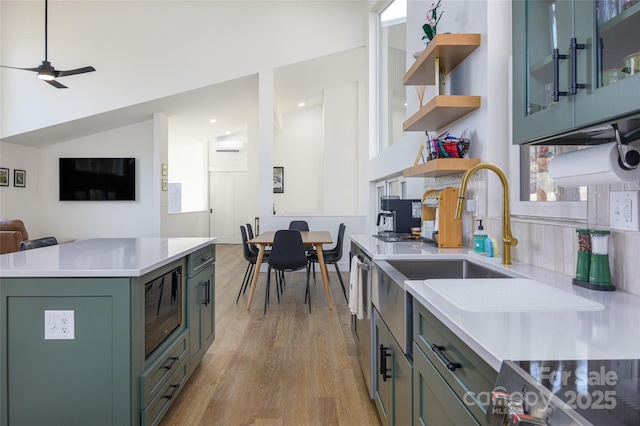 75 S Fork Trl, Lake Toxaway, NC 28747 - kitchen featuring open shelves, light countertops, light wood-style floors, black microwave, and green cabinetry