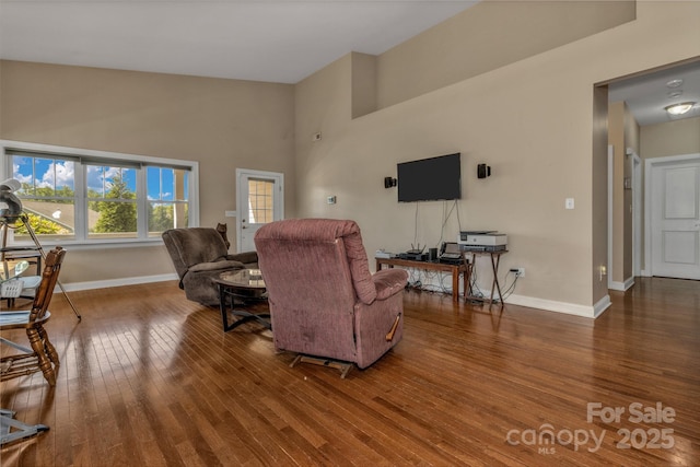 32 White Fox Dr, Fletcher, NC 28732 - living area with hardwood / wood-style floors, baseboards, and a high ceiling