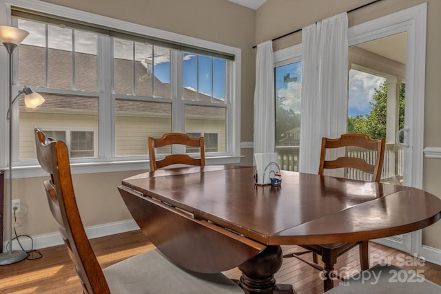 32 White Fox Dr, Fletcher, NC 28732 - dining area with wood finished floors and baseboards