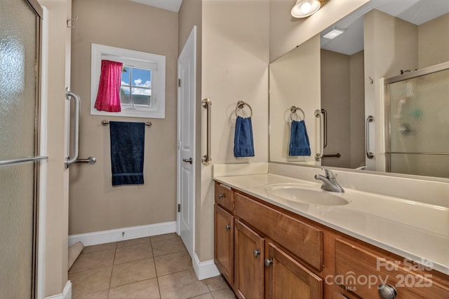 32 White Fox Dr, Fletcher, NC 28732 - full bath featuring a shower stall, vanity, baseboards, and tile patterned flooring