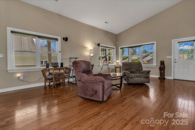 32 White Fox Dr, Fletcher, NC 28732 - living room with hardwood / wood-style flooring, baseboards, and high vaulted ceiling