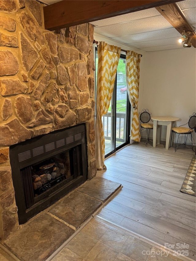 58 Creekside Dr Unit C, Banner Elk, NC 28604 - unfurnished living room featuring a fireplace and hardwood / wood-style flooring