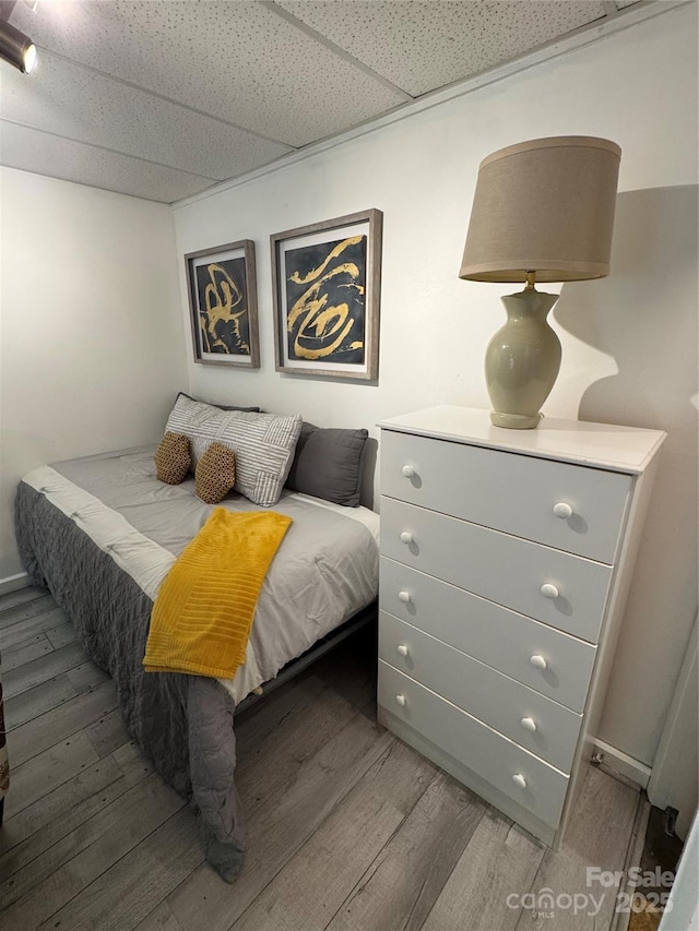 58 Creekside Dr Unit C, Banner Elk, NC 28604 - bedroom with wood finished floors and a drop ceiling