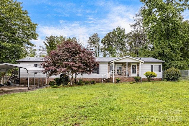 553 New Hope Rd, Rutherfordton, NC 28139 - view of front of property with a carport, covered porch, metal roof, and crawl space