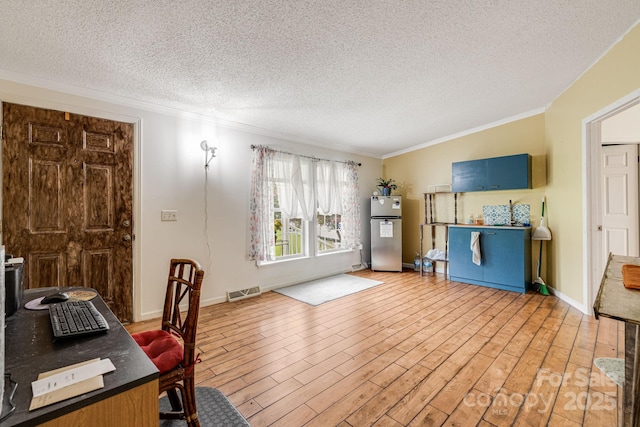 553 New Hope Rd, Rutherfordton, NC 28139 - office area featuring crown molding, a textured ceiling, light wood-style flooring, and baseboards