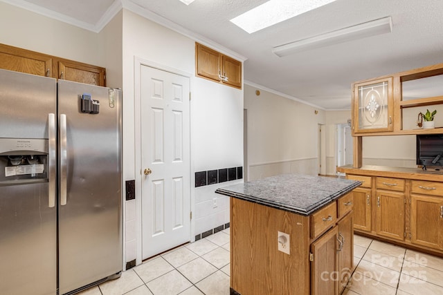 553 New Hope Rd, Rutherfordton, NC 28139 - kitchen featuring stainless steel fridge, open shelves, a center island, light tile patterned floors, and crown molding
