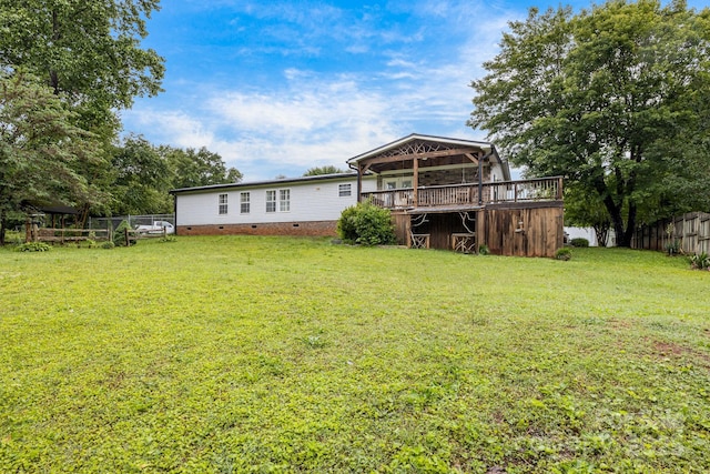 553 New Hope Rd, Rutherfordton, NC 28139 - rear view of house with crawl space and a wooden deck
