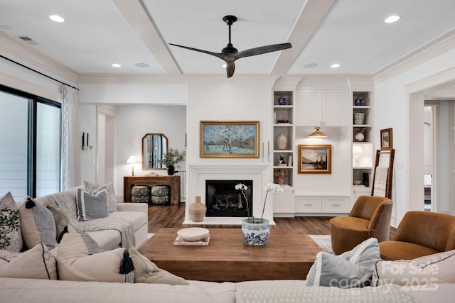 14105 Ryker Way, Davidson, NC 28036 - living room featuring wood finished floors, a ceiling fan, recessed lighting, crown molding, and a fireplace with raised hearth