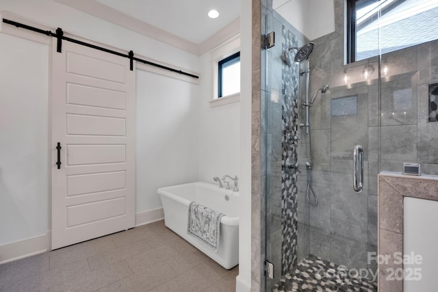 14105 Ryker Way, Davidson, NC 28036 - bathroom with a freestanding tub and a stall shower