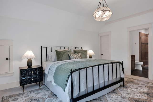 14105 Ryker Way, Davidson, NC 28036 - bedroom featuring vaulted ceiling and ensuite bath