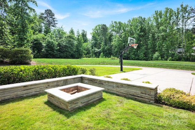 14105 Ryker Way, Davidson, NC 28036 - view of green lawn with an outdoor fire pit