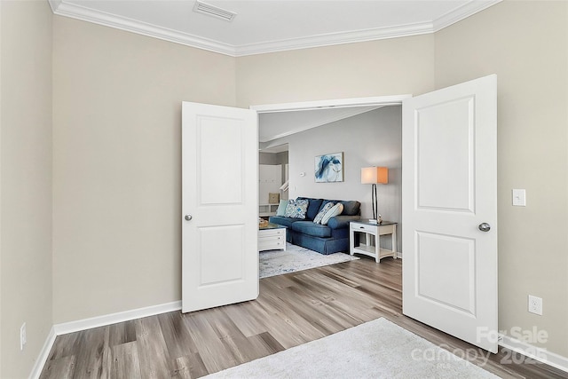 2840 Hopeton Ct, Monroe, NC 28110 - sitting room featuring ornamental molding, wood finished floors, and baseboards