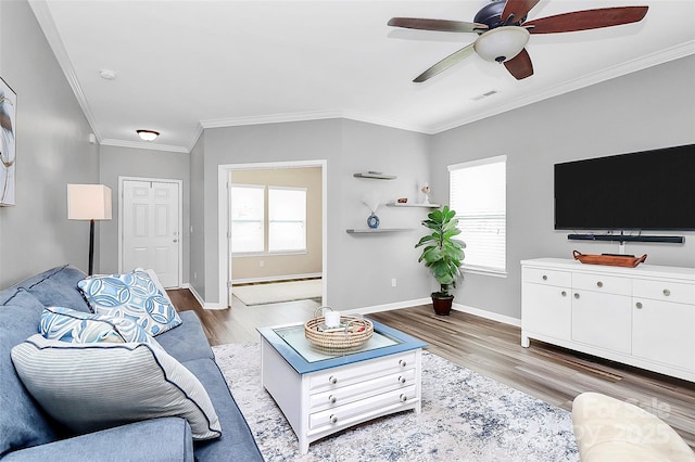 2840 Hopeton Ct, Monroe, NC 28110 - living room with wood finished floors, a ceiling fan, ornamental molding, and baseboards