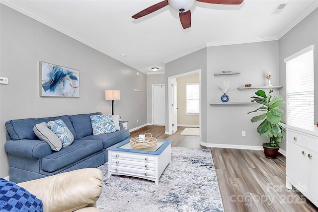 2840 Hopeton Ct, Monroe, NC 28110 - living area with a ceiling fan, wood finished floors, vaulted ceiling, ornamental molding, and baseboards