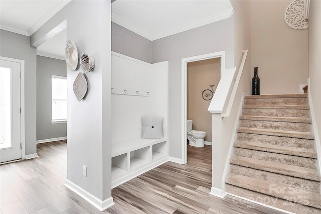 2840 Hopeton Ct, Monroe, NC 28110 - mudroom with ornamental molding, wood finished floors, and baseboards