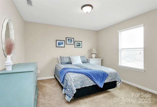 2840 Hopeton Ct, Monroe, NC 28110 - bedroom featuring light carpet and baseboards