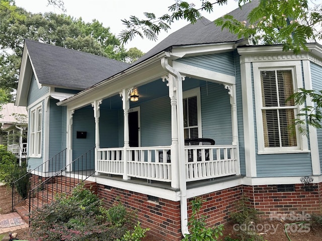 308 W Monroe St, Salisbury, NC 28144 - view of property exterior featuring covered porch and roof with shingles