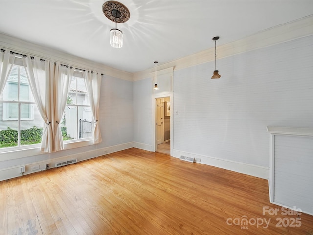 308 W Monroe St, Salisbury, NC 28144 - spare room featuring baseboards and light wood finished floors