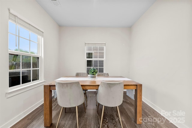1022 Hinson Forest Rd, Monroe, NC 28110 - dining area with baseboards and wood finished floors