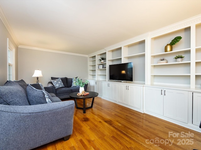 6941 Queensberry Dr, Charlotte, NC 28226 - living area with wood finished floors and ornamental molding