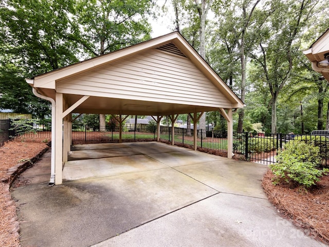 6941 Queensberry Dr, Charlotte, NC 28226 - view of community with a detached carport and driveway