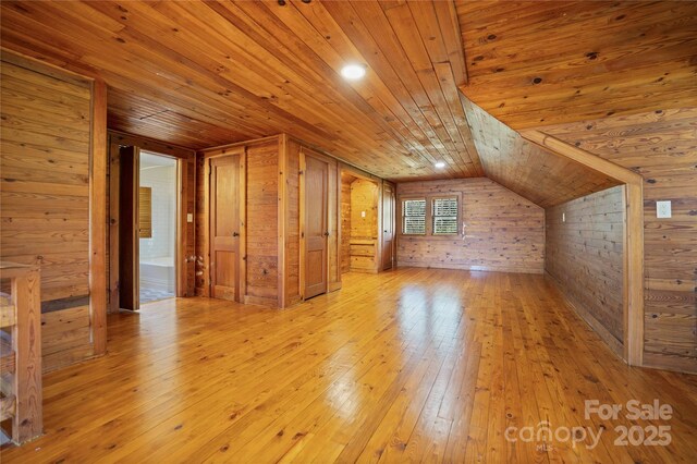 495 Fairview Rd, Asheville, NC 28803 - additional living space with wood ceiling, hardwood / wood-style flooring, wood walls, and lofted ceiling