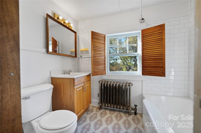 495 Fairview Rd, Asheville, NC 28803 - full bathroom featuring radiator, ornamental molding, vanity, toilet, and a tub