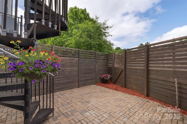 2653 Shenandoah Ave, Charlotte, NC 28205 - fenced backyard with a patio