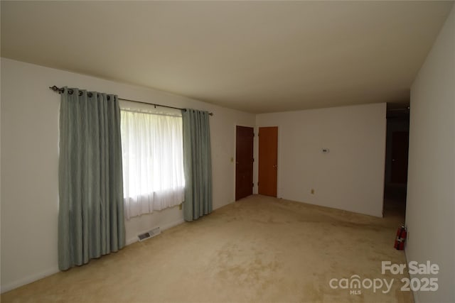 908 Ravendale Dr, Charlotte, NC 28216 - empty room featuring carpet