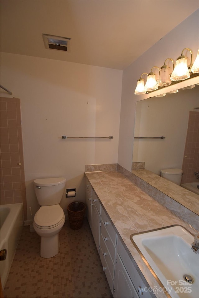 908 Ravendale Dr, Charlotte, NC 28216 - full bathroom with toilet, vanity, and bathtub / shower combination