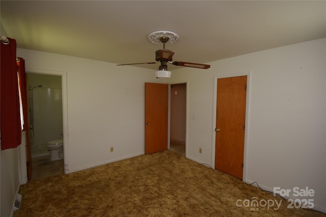 908 Ravendale Dr, Charlotte, NC 28216 - unfurnished bedroom featuring carpet flooring, ensuite bath, and ceiling fan