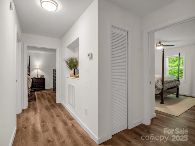 125 Woodland Cir, Rutherfordton, NC 28139 - hall featuring light wood-style flooring and baseboards
