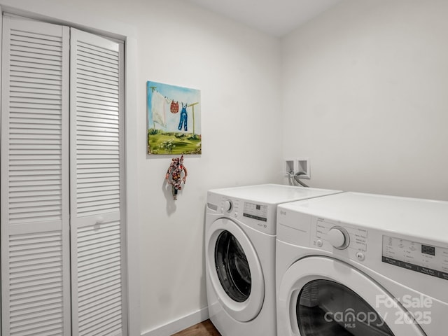 125 Woodland Cir, Rutherfordton, NC 28139 - laundry room featuring washing machine and clothes dryer and baseboards