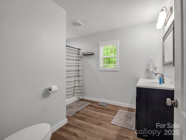 125 Woodland Cir, Rutherfordton, NC 28139 - full bathroom with toilet, vanity, baseboards, and a shower with shower curtain