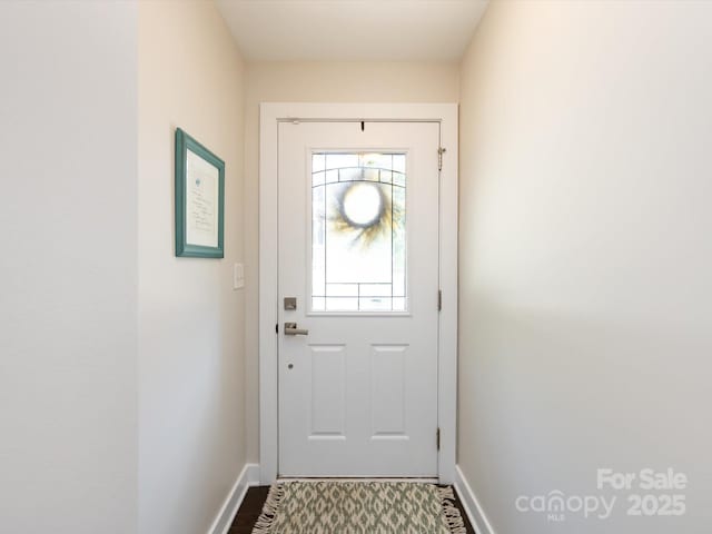1839 Shumard Ln, Charlotte, NC 28205 - doorway to outside featuring baseboards