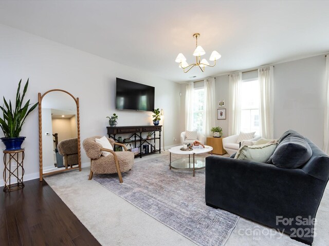 1839 Shumard Ln, Charlotte, NC 28205 - living room with a chandelier and wood finished floors