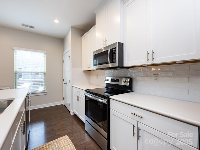 1839 Shumard Ln, Charlotte, NC 28205 - kitchen with stainless steel appliances, light countertops, decorative backsplash, and recessed lighting