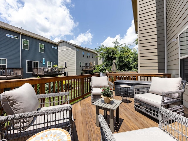 1839 Shumard Ln, Charlotte, NC 28205 - wooden deck featuring an outdoor living space and a residential view