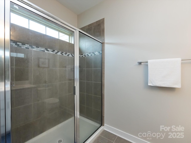 1839 Shumard Ln, Charlotte, NC 28205 - full bathroom featuring a shower stall and tile patterned flooring