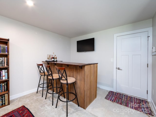 1839 Shumard Ln, Charlotte, NC 28205 - indoor dry bar with baseboards and light carpet