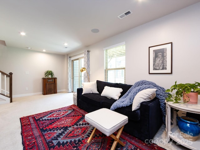 1839 Shumard Ln, Charlotte, NC 28205 - living area featuring carpet flooring, stairway, and recessed lighting